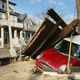 A Mini Goes Under The Boardwalk In Rockaway